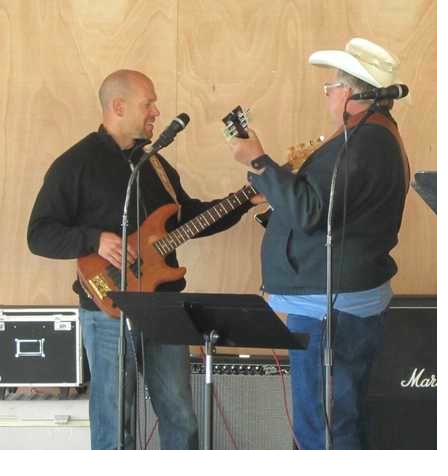 Nate playing bass with Uncle Chris